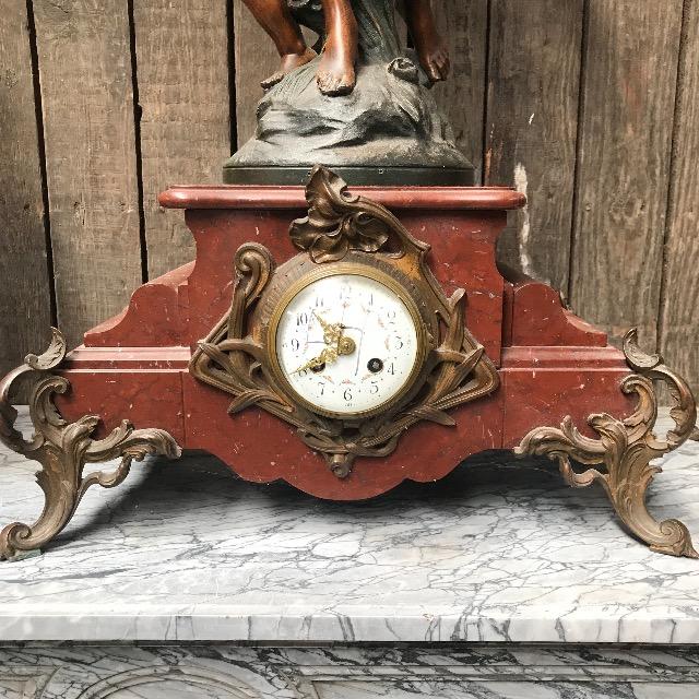 Marble clock with spelter figure 