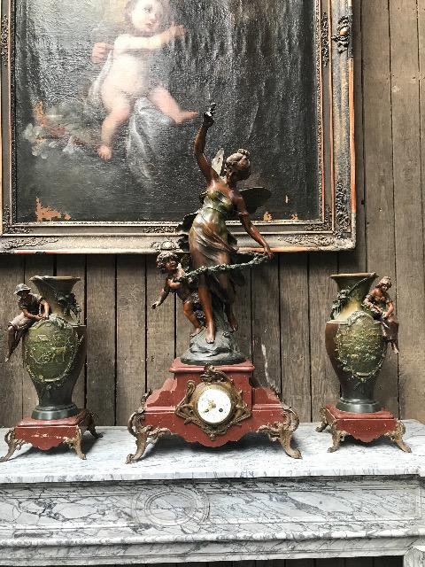Marble clock with spelter figure 