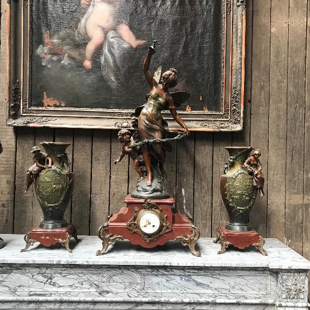 Marble clock with spelter figure 