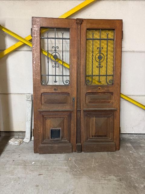 PAIR WOODEN-CAST IRON DOORS 
