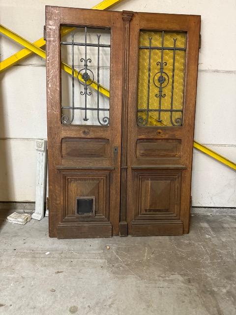 PAIR WOODEN-CAST IRON DOORS 